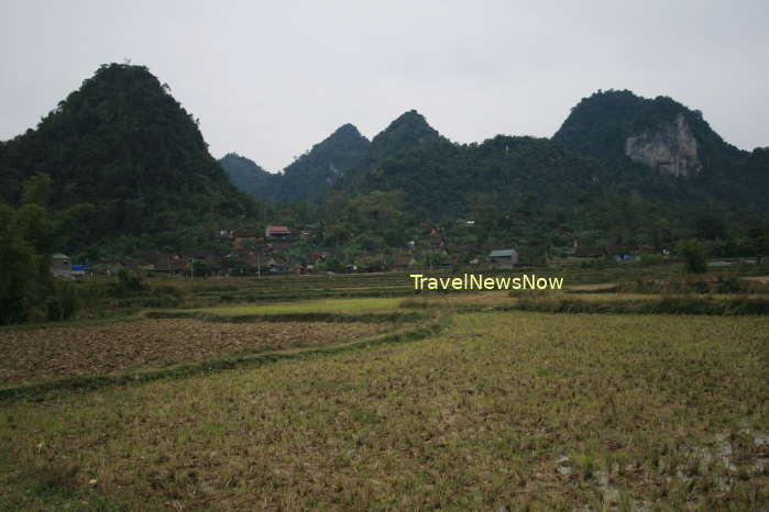 Ethnic villages leaning against mountain sides at Dong Khe, Cao Bang, Vietnam