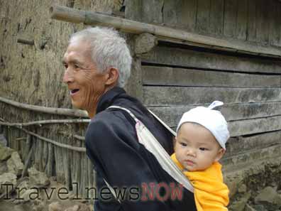 An old man and baby from the Tay ethnic group in Cao Bang