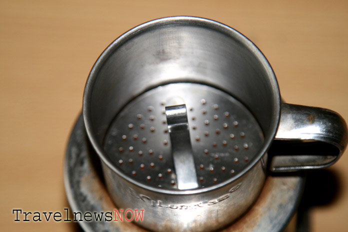 Pour a little of boiling water over the top coffee filter