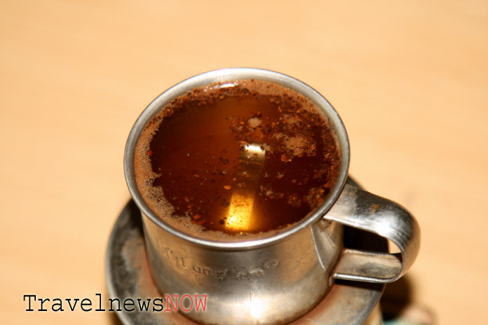 Fill the coffee filter with boiling water