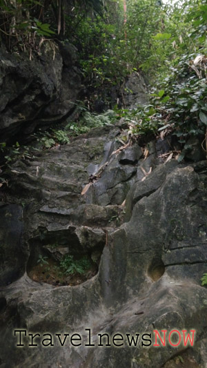 Steep and slippery path to the summit of the Na Lay Mountain at the Bac Son Valley, Lang Son, Vietnam