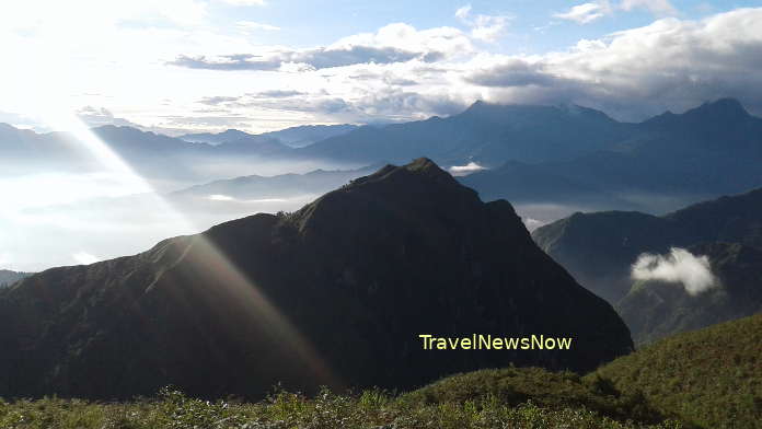 Beautiful clouds at Nui Muoi Mountain (2,400m) where travelers stay for two nights on the trekking tour to the top of Mount Ky Quan San