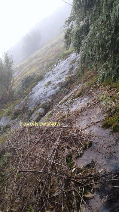 The steep, slippery, rocky, tiny path of the final push to the summit of Mount Ky Quan San Bach Moc Luong Tu is no easy task