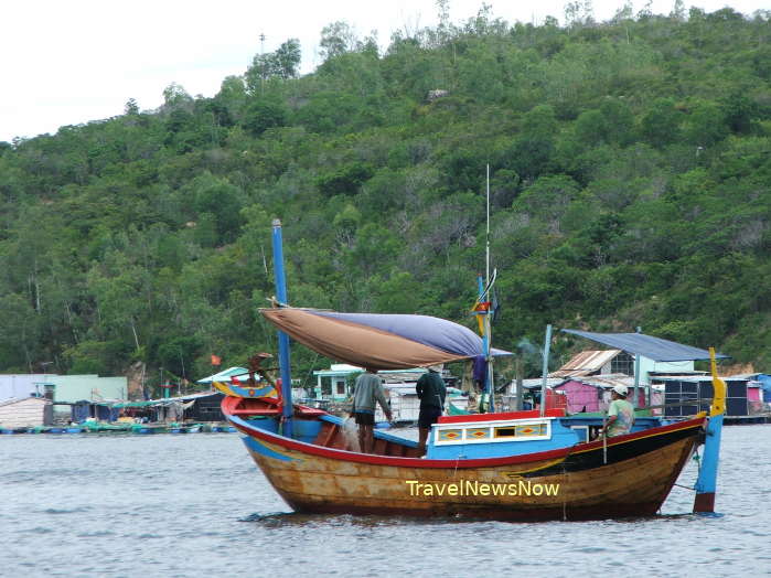 A small boat near the Mun Island on the Nha Trang Bay