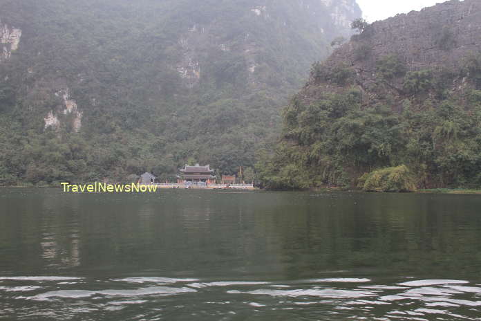 Beautiful pagoda amid lovely landscape of Trang An, Ninh Binh, Vietnam