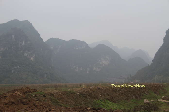 Scenic mountains at Trang An in mist