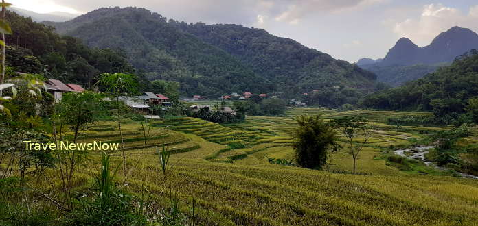 Idyllic Thai village amid rice terraces and mountains at Pu Luong Nature Reserve
